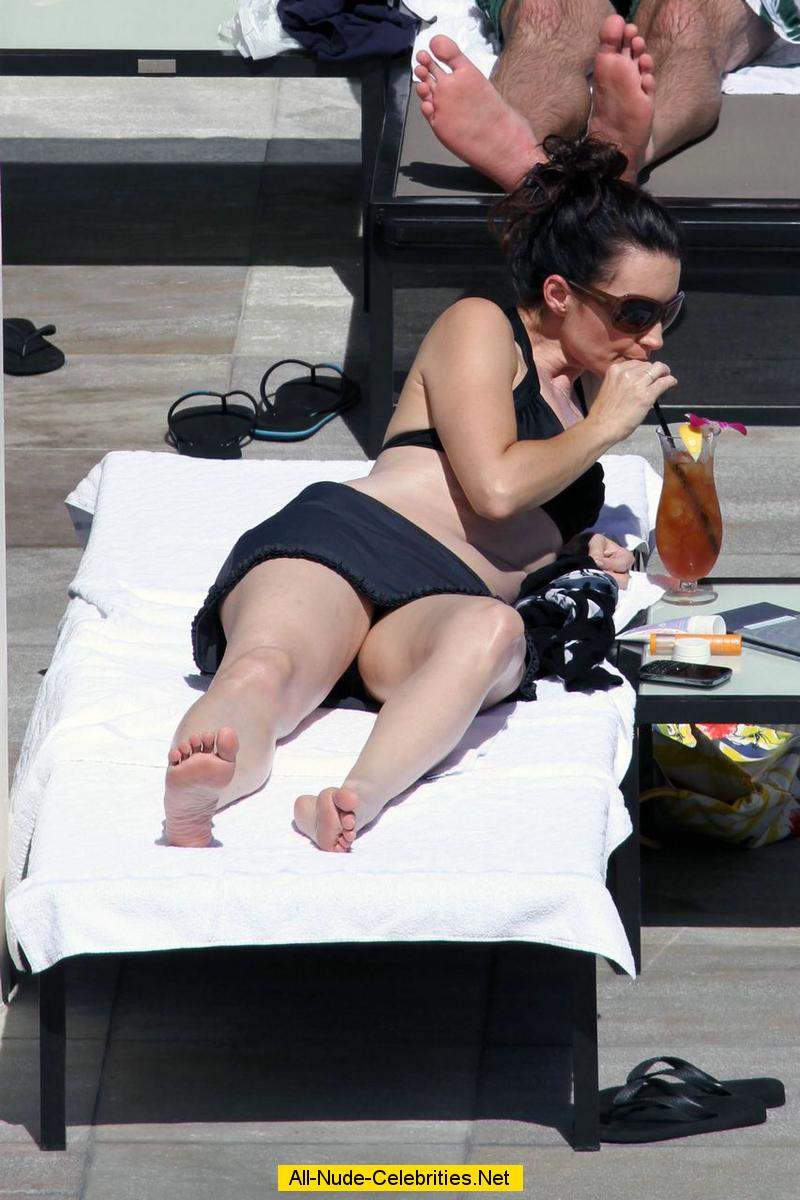 Kristin Davis poolside in black bikini paparazzi shots in Hawaii.