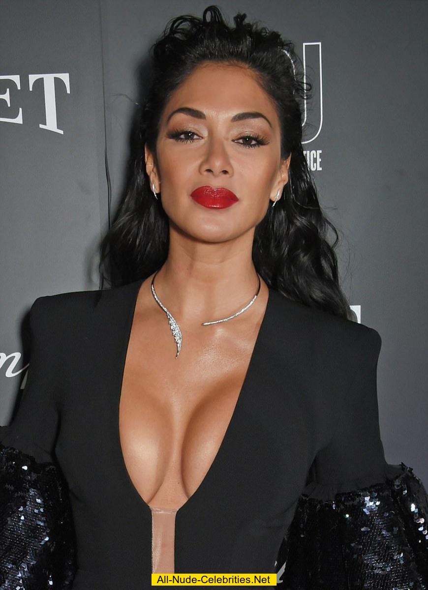 Nicole Scherzinger sexy cleavage in long black dress.