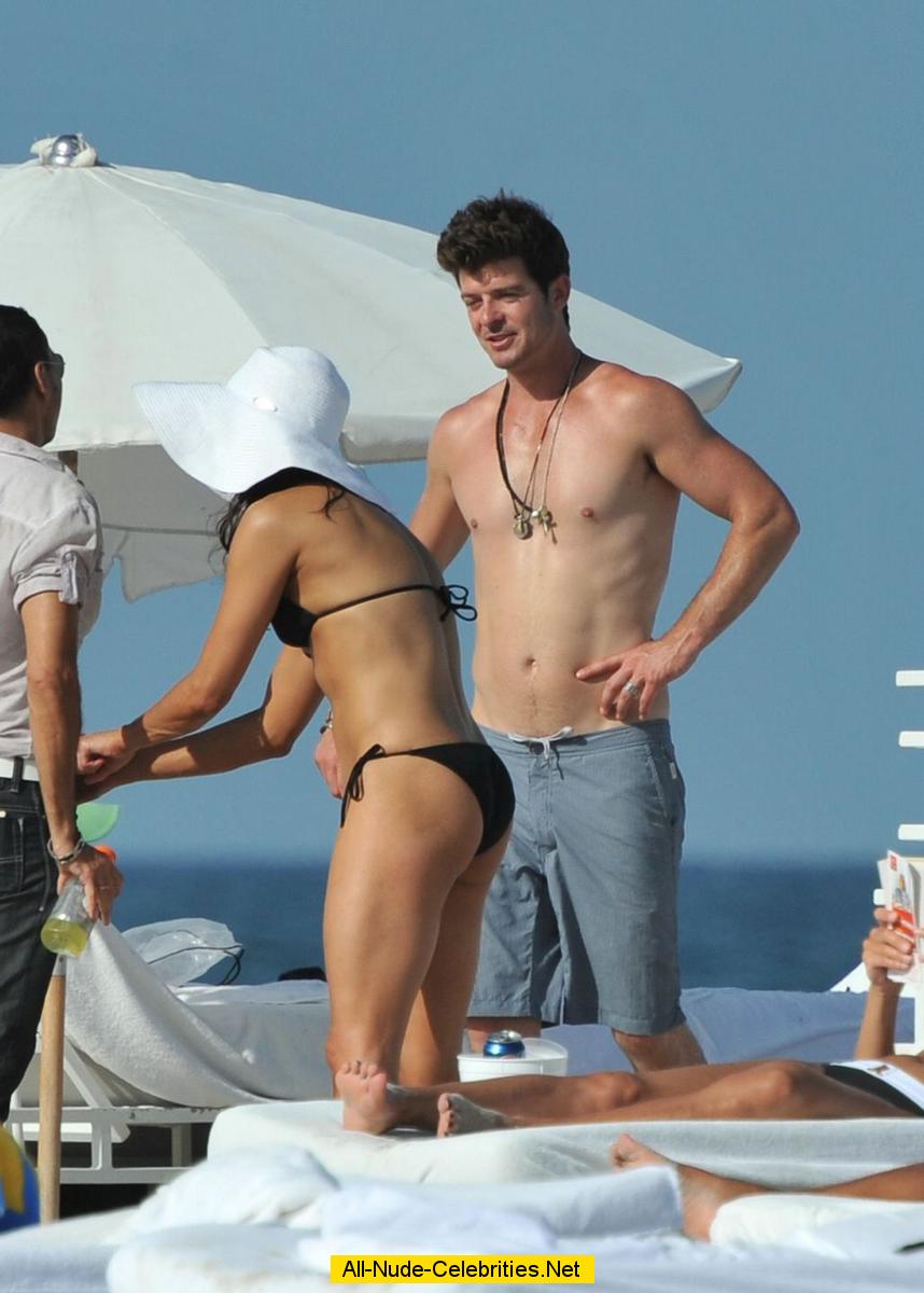 Paula Patton in black bikini on the beach candids.